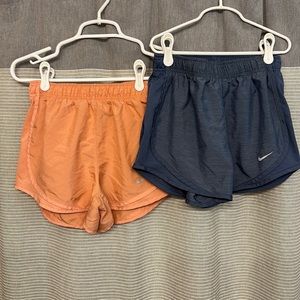 Two pairs of Nike tempo running Shorts XS